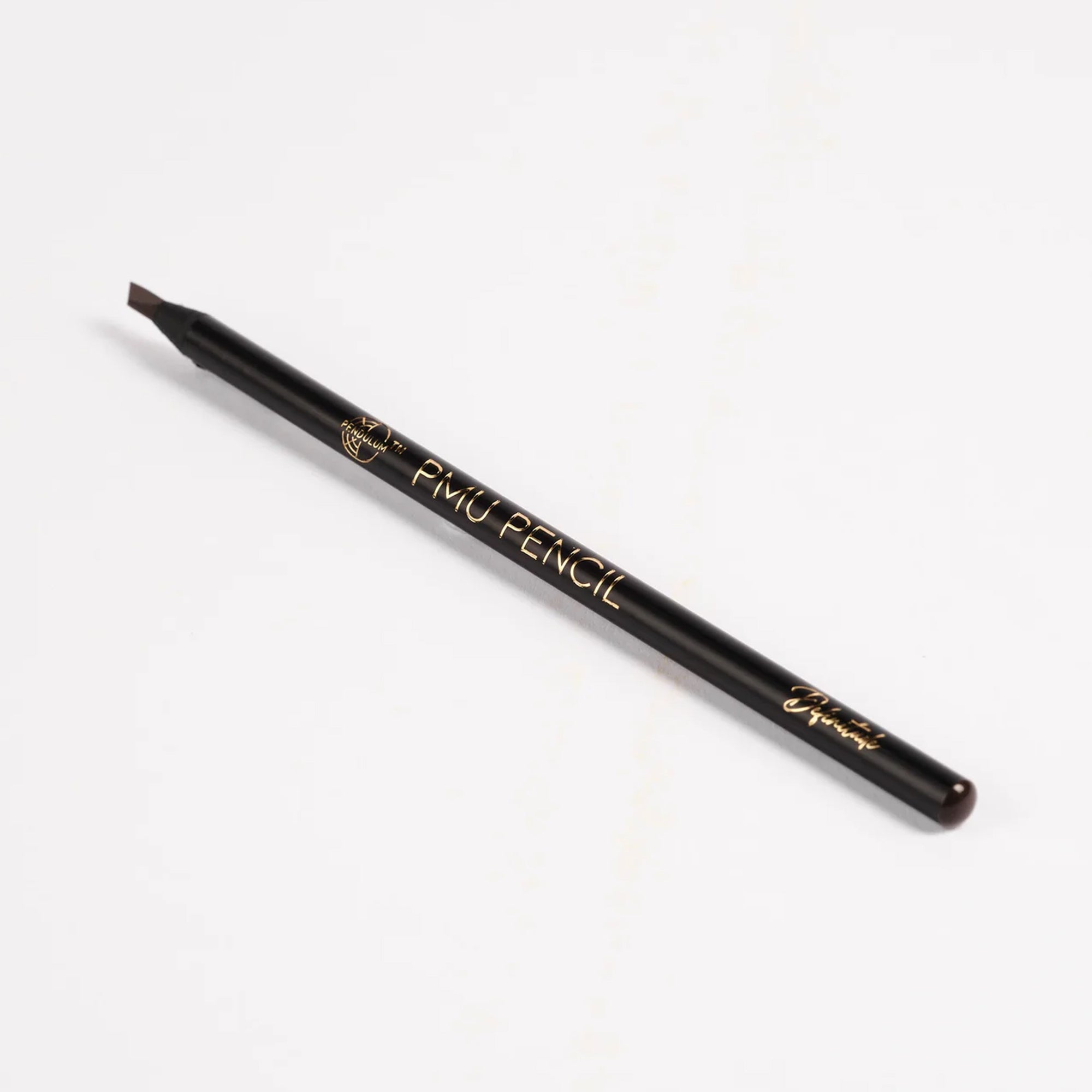 Definitude PMU Brow Pencil with an angled tip and gold branding, designed for precise brow mapping and shaping, displayed on a white background.