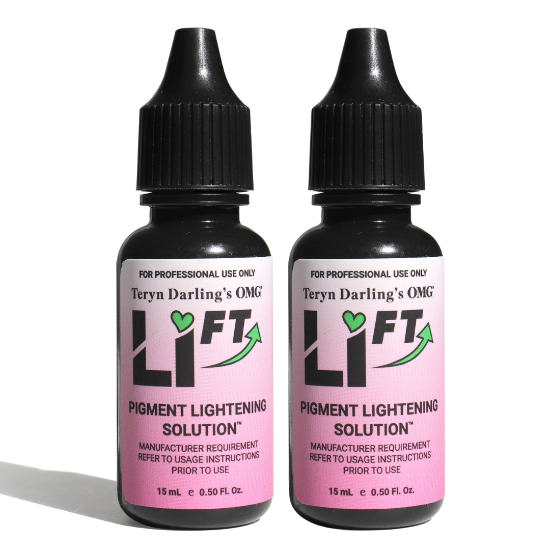 Two bottles of Teryn Darling’s OMG Li-FT Pigment Lightening Solution shown side by side, a professional saline removal formula used by PMU artists for safe and effective pigment lightening procedures.
